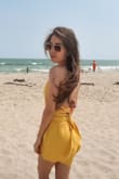 The romper has really nice fabric, and wearing it gives me an almost weightless feeling. The fabric that ties at the top is a little long, so I had to wrap it around the waist. - Gina G.