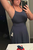 This is one of the dresses that was picked as a bridesmaid option, on a whim I decided to try it, never thinking it would work - I'm very large chested with very large hips and booty. But I put it on and instantly fell in love!! What made it better was I liked that way it looked in a mirror I usually hate never use - everyone has a skinny mirror they enjoy, this one is not that!
Please excuse the photo of the back view, the boyfriend doesn't really know how to tie it correctly yet - which is why I'm holding it up in the front view also lol. - Chelsea T.