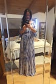 What I like:
1. Beautiful white and blue colors-makes me think of the beach
2. Flowy style-makes me feel relaxed
3. Thin fabric (but not see through)-breathable for the hot summer
4. Long enough-for my 5'2 frame with 2.5" heels but not too long for gals who are taller  
    than me

Other notes: I've purchased similar dresses in the past and the material was much thicker. Also, the dresses were much longer that made it hard to feel relaxed with higher heels OR costs too much to have it altered.  This length of this is great.  At 5'2 and in XS, my dress sweeps the floor a bit, but doable.  Hope it will shrink a tad after wash.  I prefer to wear sandals most of the time.  The neckline gaps slightly but does not expose anything I'd be worried about.  The elastic waste band is perfect.  The tie and side slit add a little more pizzaz to the dress.  It may look baggy shapeless on smaller girls and me at times but I love the relaxed feel and look of it enough to keep. - Thian O.