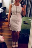 This dress fit absolutely perfect and hugged in all the right places! You cannot see your bra underneath. Ordered the white on white and was perfect for baptism. - Megan L.
