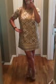 Got the dress to wear to work. I received a lot of compliments on it! I was a little unsure about the dress having no shape but it's cute. You have to be careful to not lift your arms or bend over in the dress because it does lift very easily due to the cut/style. - Traci L.