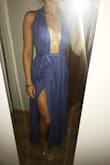 I love this dress! I saw a girl wearing this at a wedding and had to ask her where she got it. I ended up ordering it so I can wear it at my friend's wedding later this summer!! The only bummer is that it is a bit revealing... I wish it didn't open up so much. I am going to bring it to a tailor to see if they can cover that area up a little. Overall, it's amazing though! So excited to wear this!! - Maddie T.