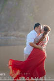 My photographer recommended a bold red for our beach session, so I wouldn't be washed out in the background. As well as chiffon so the material can flow in the wind. This dress was more than perfect! - Rachel S.