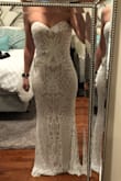 I bought this as a surprise second wedding dress for my big day. It's literally perfect! I have very small boobs and I'm on the shorter side so the dress is a little large in the chest and needs to be shortened, but that's the norm for me. Otherwise, it fits great and looks even better! - Rheana P.