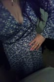 I've been obsessed with this dress for over a year and finally got it! After reading previous reviews I almost sized down and got a small, but I am glad I went with my normal size instead. I have broader shoulders and somewhat toned arms, so this dress fits a bit snug in those areas. I thought about returning for a large but at 5'6" I have maybe an inch or two of extra material brushing the floor already. The bell sleeves are a nice touch, cute but not overly dramatic and in the way. The "V" neckline of this dress is much less severe on me than it is on the model, it frames a small view of my cleavage nicely. This dress is a little more casual than I had anticipated, but I also feel like the strong print demands that hair and makeup game be in point. Overall I am pleased with my purchase. - Rebecca W.