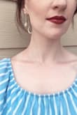 These are light so they don't pull down on your lobes, and they are beautiful. The first time I wore these out, I had about 10 compliments from women about them. That's a good sign that it's a keeper. :) - Hannah H.