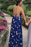 This dress was perfect for an outdoor (and warm) summer wedding! I loved how it flowed and I could dance the night away! I received many compliments through-out the night. The ties in the back surprisingly kept my girls in place-no bra? AMAZING! The dress was definitely on the longer side even with my heels on, and I'm on the taller side! - Sarah M.