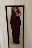 I REALLY wanted to love this dress but ended up returning it. The material is really nice and it hangs wonderfully but the pockets create this extra bulge at the hip that looked awkward on me and I couldn't get past it. Looking back at the pictures of it, it does seem like they choose angles and poses that hide this a bit. I hadn't even realized that it had pockets until it arrived. This may not be a problem for everyone, it just didn't work for me. - Elizabeth C.