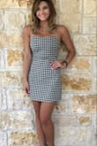 I believe this dress runs true to size. Love the quality and color of dress! Super super cute! - Melissa W.