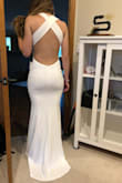 I absolutely love this dress. It fits true to size. It is elegant, classy and yet sexy. The quality is definitely there and it drapes beautifully. It is absolutely perfect! - EMINA A.