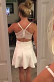 The lace detail on the back and front make the dress so feminine. Perfect for a date night out. The lace is great quality and holds together nicely. - Danielle S.