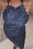 Love this dress. I ordered it for my son's wedding rehearsal dinner. I normally take an 8 but I felt that it was too short and a bit too tight to the point where if I put a strapless bra underneath it would be too tight. I went up to a large and it's perfect it gave me an extra maybe 3 inches in length as before when I bent down you could see my underwear. Good quality fabric gorgeous color I'm going to order one in the champagne color too. The back wasn't tied in the photo, I couldn't do it myself so it looks a bit loose. But you get the idea. - Lisa W.