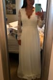 I loved this dress as a contender for my fall wedding dress, however the sleeves weren't quite fitted to my arms and I just felt frumpy in it. I think it looked OK but just didn't feel right to me. I ordered a L. - Leslie B.