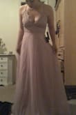 Ordering this dress for a bridesmaid dress and it's so beautiful! Straps are adjustable, could get away without wearing a bra (score!) and very flattering. Only complaint, I will have to pay for alterations because it's so long on my short self. - Amanda B.