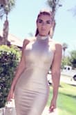 It's elegant dress, true size . The material is shine and nice . - LILIANA O.