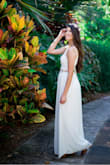 The dress fit perfect. When I was in search for a white two-piece maxi dress, I was concerned about the skirt being bigger than the top or vice-versa. And I actually bought  two- piece dresses before and the skirt was big or top was big. One or the other was the issue. However, this dress is perfect. - YASMIN T.
