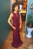 This is a junior sized/cut dress so it's cut a little small. I could not zip the XS and the Small is just a tiny bit too big. I think once I get it hemmed and get a slight alteration it will be perfect for my daughter's wedding venue. I expected I would need to get it hemmed because Iâm only 5'2".. Here are 2 pics before get it altered, but will post after as well!:) - Nancy M.