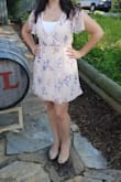 I was worried it would be short but ended up being the perfect length.
It has a lining but still a little shear if you wear anything other than a nude color underneath. - Christina B.
