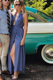 I wore this dress to a summer wedding and it was fabulous. I got so many compliments and felt like a hottie. The only thing is I don't have much boobs to fill the front of the dress it was a little large there and was a bit long but I wore 4 inch heels so it worked out! Highly recommend! - Emily L.