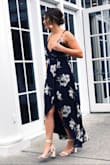 LOVED this dress! I wore this dress to a wedding, where I was a guest. The material is light, but not sheer by any means. The dress is a traditional wrap style dress, which was very easy to put on! Absolutely loved the sleeves on this dress. Can't wait to wear it again! - Kiley G.