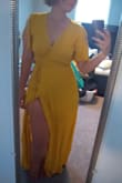 Was pushing this dress as an option for my bridesmaids in MY wedding, and liked it so much I bought one for myself. The material is not as nice as I was expecting, it has more of a gauzy feel to it which I don't mind. The top is definitely see-through, so I'll have to wear pasties, but I really like this dress. I'm obsessed with wrap dresses right now, and this one is no exception. I'm 5' 6" and this just skims the ground barefoot, so I'm glad I will not have to get it hemmed. The fabric was crinkly out of the package, but a quick stream would fix that. Overall very satisfied. It's lightweight and is comfortable to wear on a hot day even though it is floor length. - Kimberly D.