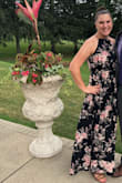This dress is absolutely beautiful. Wore it to a summer wedding and felt so comfortable. The slit is just sexy enough, but now too revealing. I went with a large because I have a bigger chest and wanted a little breathing room. - Rachel M.