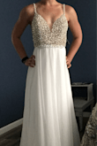 Where do I start with this dress?! I absolutely love it and the pictures do not do it justice. I wasn't doubting the quality when I ordered it, but it far exceeded my expectations for only costing $250. I purchased this dress for my wedding in Colorado next year. The only alterations I will be making is a hem (about 3 inches) and swapping out the cups for a push-up since I am very small-chested and there is still some room in the cups even with a sticky bra. Overall, I am extremely happy with this dress & can't wait to wear it on my wedding day! - Jamie E.