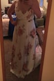 This dress is gorgeous, I bought it for a photo shoot. It's to die for. The top fits a little saggy, but that could also be because I'm breastfeeding and my chest is a little wonky these days lol. But seriously, this dress is a gorgeous wrap dress and I adore it. - Victoria D.