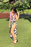 I am sooooo obsessed with this jumper!! I wore this to a luau in Maui and received a million compliments. It definitely made my day! The material was so light and airy it made the jumper look amazing while I walked. The straps adjusted perfectly in the back, allowing the jumper to fit my curves just right. The slits do come up pretty high so I wouldn't recommend wearing this out normally around town, but for a beach side vacation it was perfect! - Sonam T.