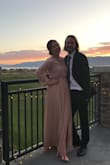 I stitched down the slit some in the front so it didn't go so high, but I absolutely loved this dress! I wore it as a bridesmaid for a wedding, and I still get so many compliments each time I wear it. It's lightweight, comfortable, and breathable, but you still feel elegant and beautiful when you wear it. I'm fairly pale, but it didn't wash me out too much. I'm normally a medium but the small fits much better. The sleeves and length are still a tiny bit long for me, so it definitely runs large. Love the dress! - Kjersten J.