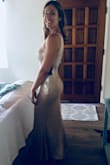 This dress is absolutely stunning! I wore it as a bridesmaid dress and I didn't want to take it off! I was a bit nervous about ordering a small but am so glad I did based on the other reviews. There is just enough stretchy material to show off your curves without being too tight, allowing for the perfect fit. I'm pretty tall and somewhat busty, and the size small fit so well, I feel like the dress was made just for me! Definitely recommend buying this dress. - Ilona J.