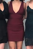 love this dress!! material has give but not too much so it holds you in. low cut but the girls looked good so I didn't mind. side zipper got stuck on the fabric a few times but just needed a friend to help and it went up fine. the picture shows it after I had been wearing it for a few hours. - Emily N.