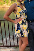 Wore this dress to a wedding in Texas and it was a hit!! Very comfortable and flowy with just the right amount of skin showing. It did wrinkle a bit in my suitcase but was fixed with a quick swoop of an iron. It is pretty flowy. I think I could have gotten away with a size small, although the length may be too short. - Olivia P.