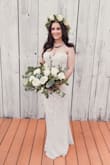 I ordered this dress as a backup for my wedding. Every review was so positive and the price was so reasonable, I figured why not! I LIKED my original dress but wasn't in love with it. The second I tried this one on, I didn't want to take it off. I knew my original dress was done and this was the dress I was walking down the aisle in. We had a barn wedding, I had a huge flower crown, so the simplicity yet elegance of this dress was absolutely perfect. It fit like a glove, but most importantly I felt SO good and comfortable in it. The only adjustment I had to make was get it trimmed a little bit because it was too long for me. I was able to leave the back long and the front just right for me. I would recommend this dress to anyone! It was perfect for my special day and I was completely in love with it ! - Adriana B.