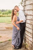 It's lightweight and flowy. Wore it in my engagement photos and it was very comfortable! I wore it as a halter dress instead of tying the straps together on my shoulders. - Jessica C.