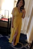 I wore this dress to a wedding and received many compliments. This dress was exactly what I was looking for.. something comfortable, classy and forgiving after a night of eating & drinking. Although, it took awhile to figure out how to tie it, still not sure if I tied it correctly. Fake it till you make it! - Mechelle T.
