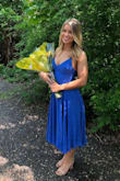 This dress is definitely my favorite dress I have ever bought. It is high quality material, but the blue is a little brighter in person. It is not see through at all and you don't need  bra. - Lindsay P.