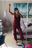 This jumpsuit is sooo cute!! Was a little worried that it wasn't going to work with my bra size, but I am able to wear a strapless bra without it showing at all! Haven't washed it yet, so it might shrink. Probably going to just hand wash. Overall would recommend, love it!! - Brenan K.