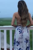 This dress is absolutely beautiful!! I wore it to a summer wedding and received a lot of compliments. It's also really comfortable which is always a plus! - Andrea M.