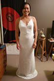 This dress is very comfortable and it hugs your curves well. Perfect for my beach wedding! The adjustable straps were solid and felt secure. The lace is beautiful and delicate looking. Slightly long for me, but that's an easy fix. - Tammie L.