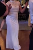 It was a little long so I had to get alterations. Top was a little bit but I could get away with no alterations. Everyone loved it! It was light and easy to dance in. - Jenna F.