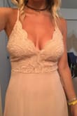 I loved this dress! I wanted to keep it badly, but I was going to be standing up in a wedding and I'm a little particular about how much chest I show when I'm in weddings. I ordered a small and thought it was just a little loose in the midsection, but fit my chest area great. It was definitely long for me but so pretty and flowy! I also didn't have to wear a bra with it which is fantastic! I would have kept this dress if it wasn't for how much cleavage was showing, but alas, I gotta return it. - Rachel P.