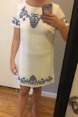 I love the cut of this dress. It doesn't hug close to my body so I can hide my stomach but also doesn't look frumpy. The white made me nervous but the inside liner is great, you can't see through the dress like most white materials. I highly recommend! - Kathryn H.