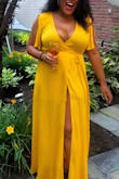 I got lots of compliments and it worked well in the scorching summer heat. I love how flowy the dress is and how it moves. I am on the bustier side, so I could have gone up a size, however it wasn't available, and I was willing to sacrifice a little more cleavage than usual for this gorgeous dress! Though it was on the sexier side in the neckline, I think it still turned out quite tasteful.
Side note: the split does go up quite a ways, and you definitely have to be aware of that while walking to avoid any potential wardrobe malfunctions :) - Onika A.
