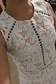 The material is good quality and thick, I purchased it because most reviews said that it was white but it is a faint teal up close. I purchased the XS and it is very form-fitting. - Jessenia C.