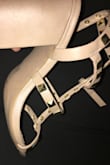 I usually wear a 5, but their smallest size is a 5.5. They fit well on the length but the straps on my right foot are very wide. The heel is thick and comfortable for all day wear but the studs have no material covering their backs between the metal piece and your foot which can be uncomfortable. - Jessenia C.