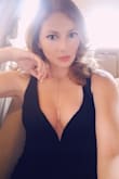 I wore this out and on a party bus a few weeks ago and got compliments all night! The length was great too. It definitely shows a bit in the front but that was what I was wanting! - Heather P.
