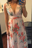 I'm happy with the fabric and the pattern. I usually order a medium in Lulus but this dress doesn't fit as well as I expected. The band across the torso fits a little above my natural waist, right across my rib cage and it's veeeeery snug. I'm smaller chested so I needed to have the straps taken in - as soon as I relaxed my shoulders they would fall down. I think if I had sized up there would have been way too much fabric so I stuck with the medium. - Christine G.