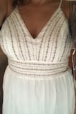 I used this as my wedding dress and loved it. The detailing at the top is beautiful and it's very comfy. I am short so I had to tailor the bottom a little, but it was easy to do. Highly recommend! - Nicole M.