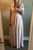 The Dress fit perfectly. It was a little long with flats, but with heels the dress was perfect. Got a lot of compliments and the color is beautiful. - Mariska V.